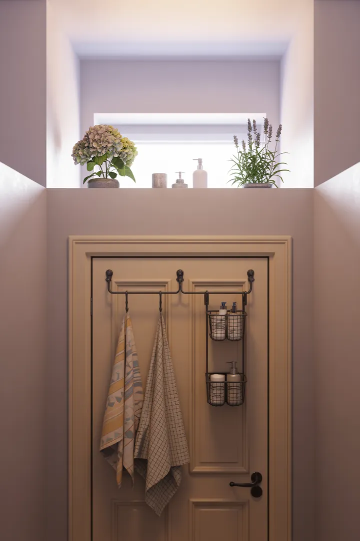 Ein stilvolles kleines Badezimmer mit cleveren Möbeln, hellen Farben und kreativen Dekorationsideen, die den Raum großzügiger erscheinen lassen.